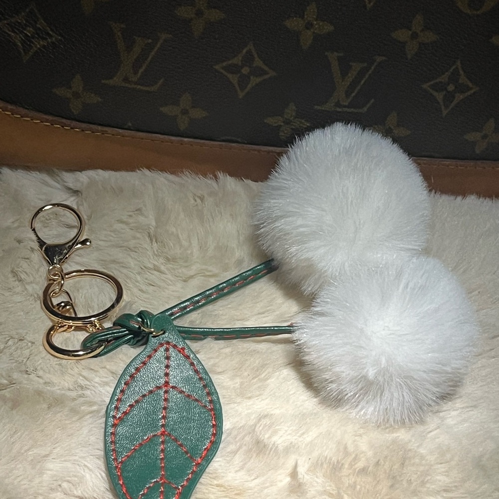 White Fluffy Pom Pom Keychain with Green Leaf Accent